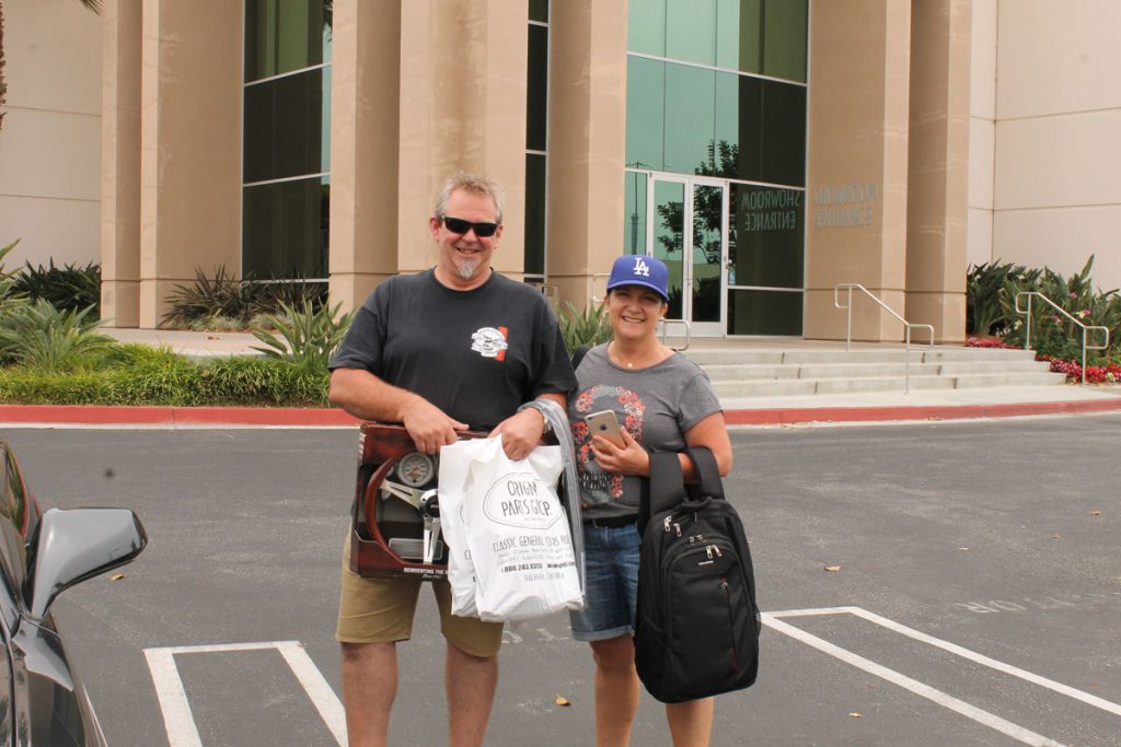 Man and woman with shopping bags
